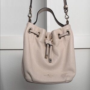 Kate Spade Pebbled Leather Drawstring Bucket Bag in Light Beige/White